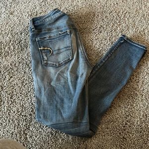 Ripped American Eagle, blue jeans
